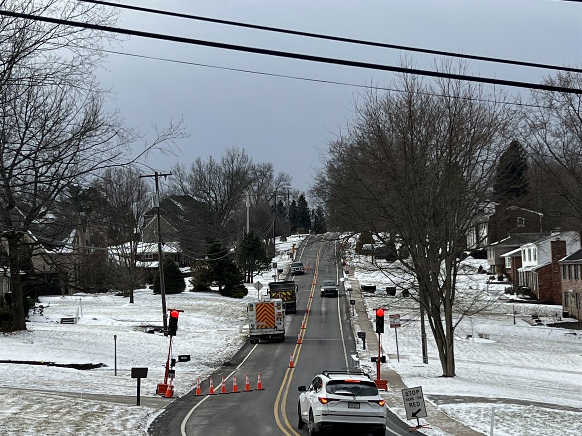 Winter lane control with portable signals and cone taper